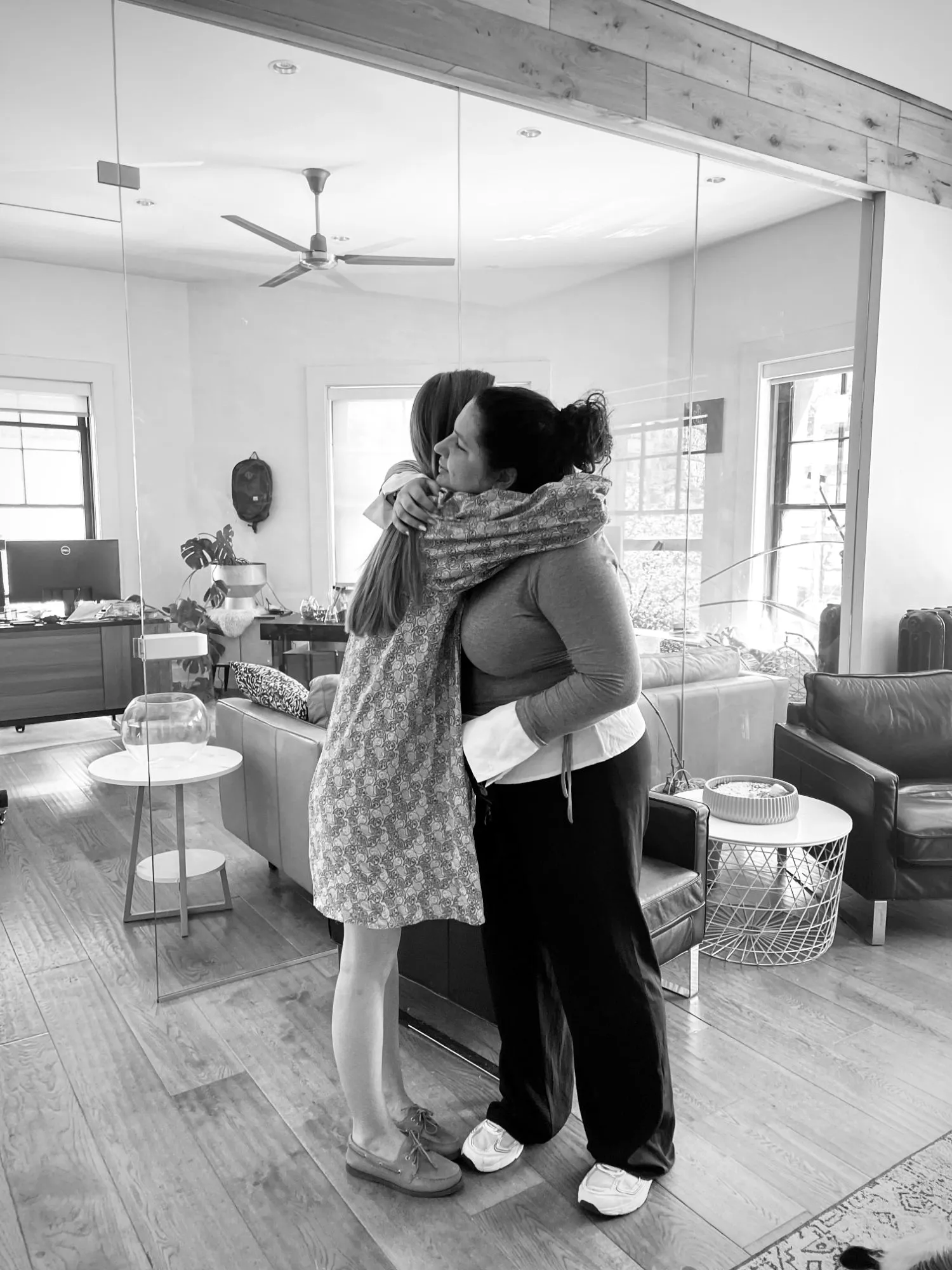 A hug in the studio lounge