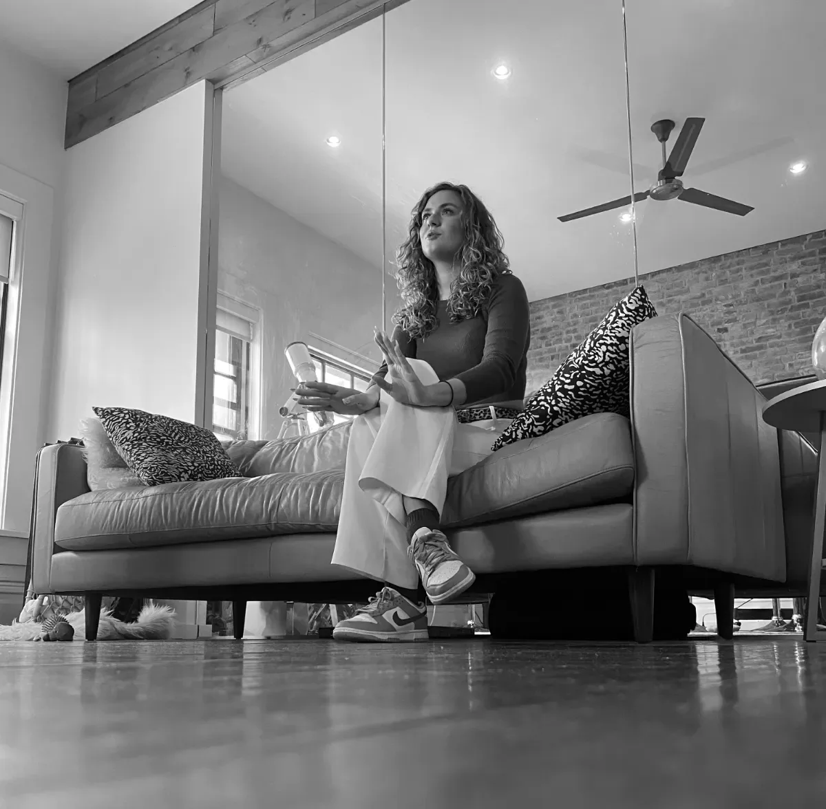 Perched on the couch in the lounge